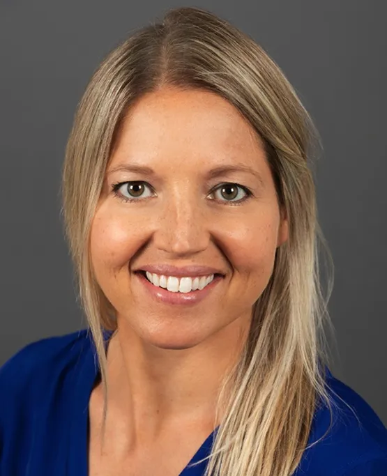 Headshot of a blonde woman, Julia McSweeney.