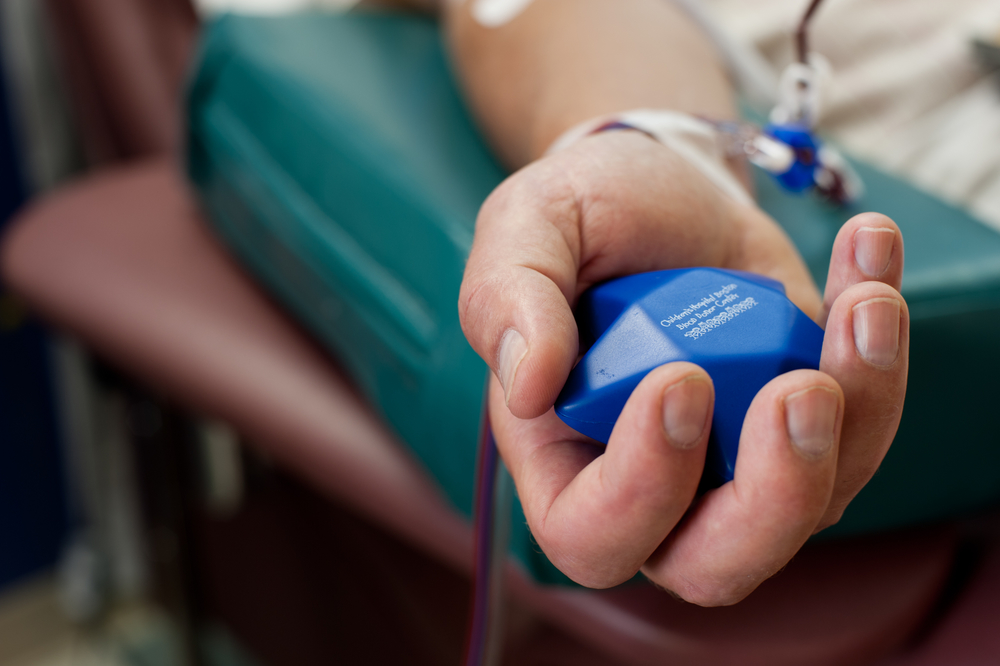 Hand of a person donating blood