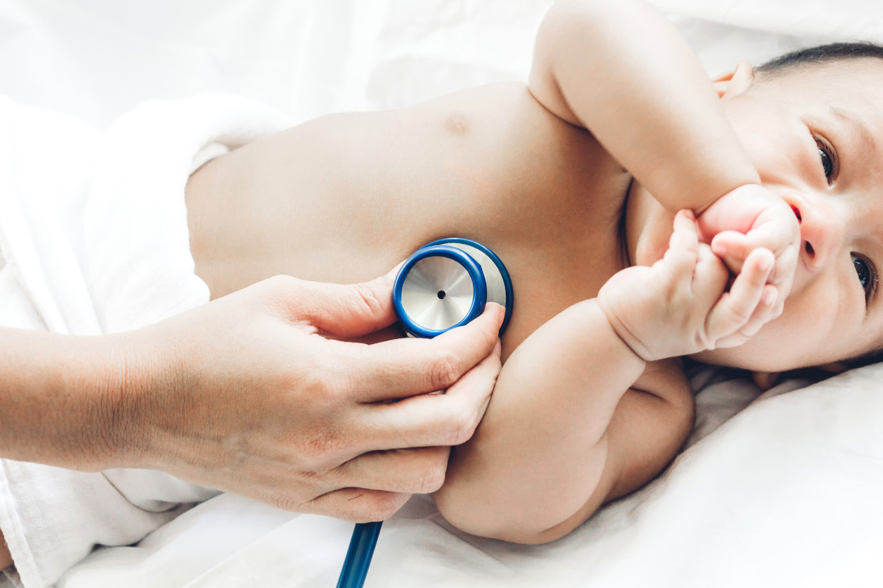 Stethoscope held on baby's chest
