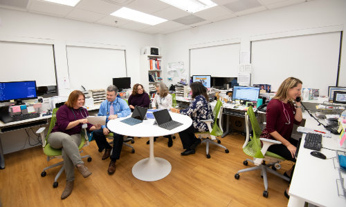 a group of doctors in an office