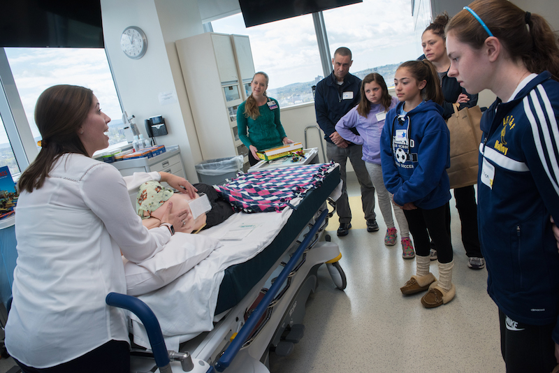 Children in an operating room before their scoliosis surgery