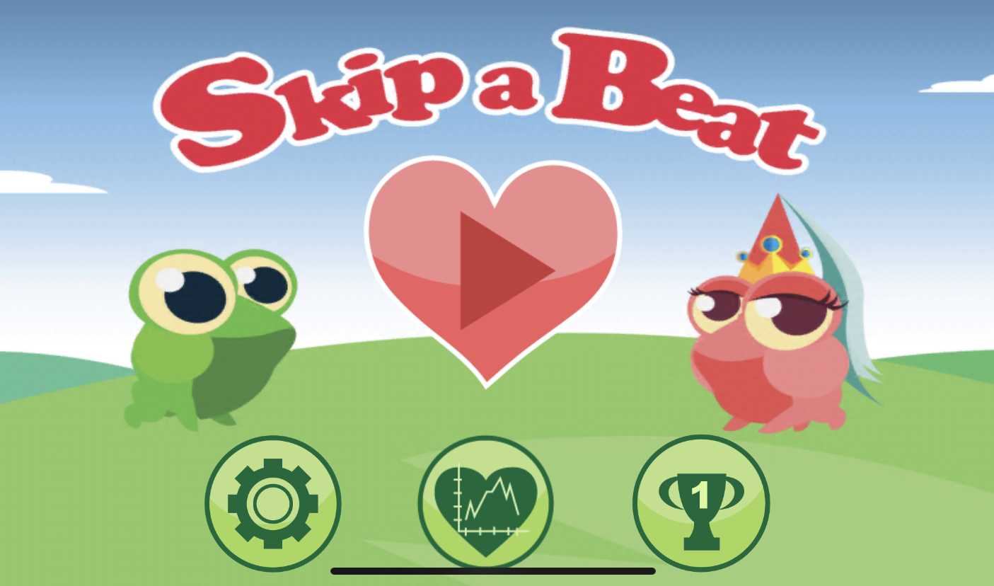 A green frog and a pink frog with a princess hat are on top of a green hill with blue sky and between them is a pink heart; above them is the title in red - Skip a Beat.