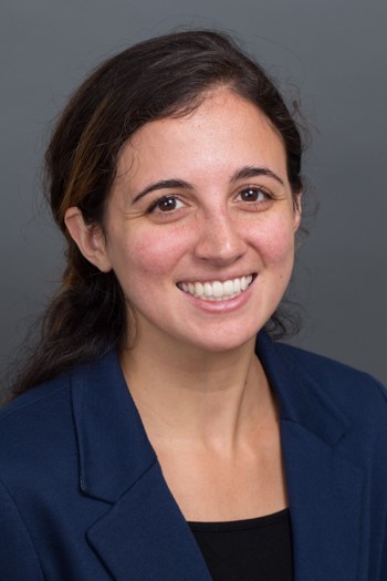 a headshot of a smiling woman