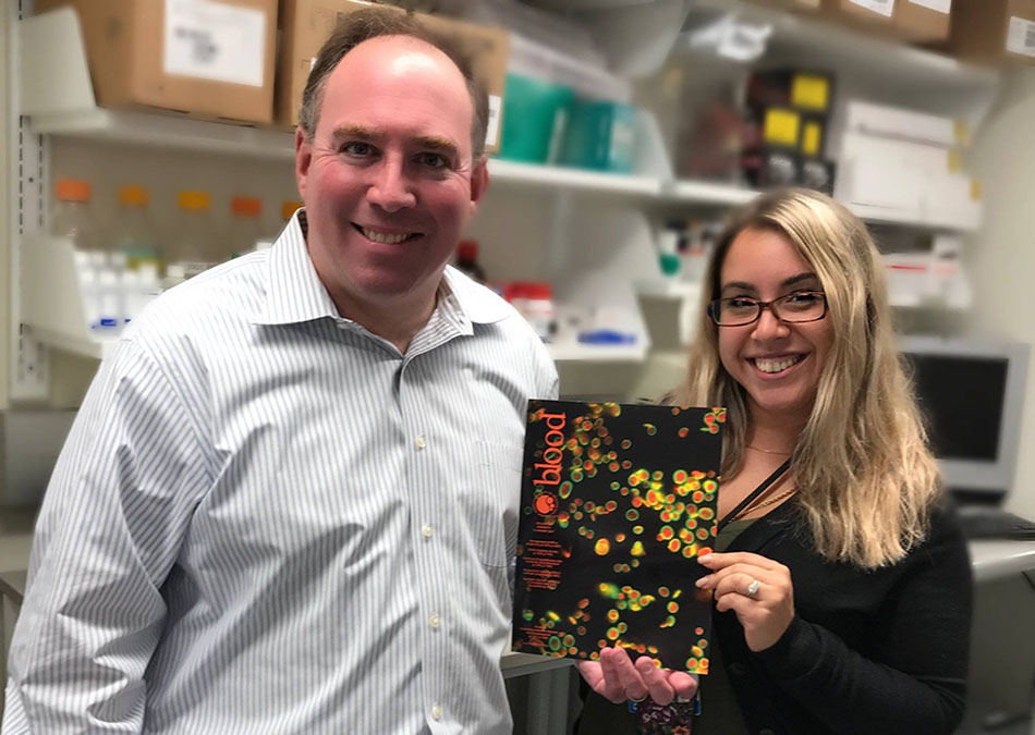 Joseph Italiano and Kellie Machlus in the lab