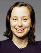 Headshot of a brunette woman, Sarah Nelson.