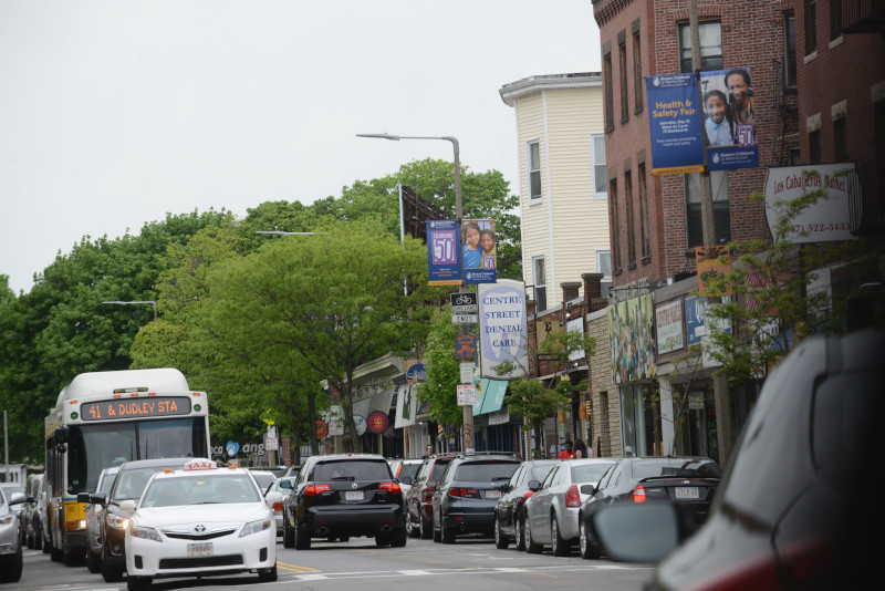 The MBTA's 41 bus travels through the busy Jamaica Plain business district.