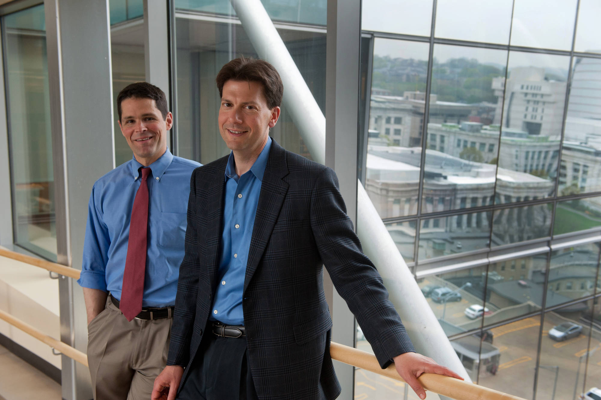 Doctors stand on hospital skybridge