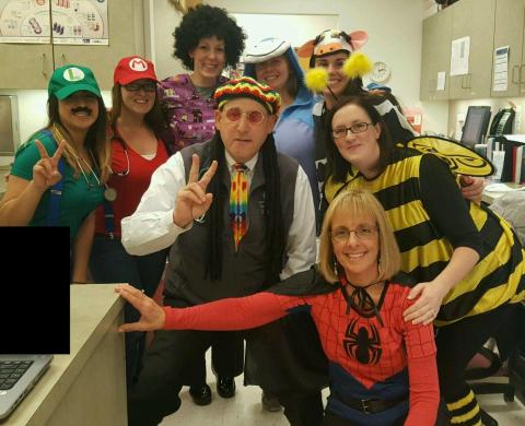 a group of doctors and nurses in halloween costumes
