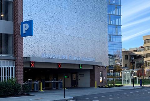 A closed parking garage with a blue P sign to signal parking.