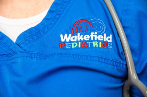 wakefield pediatrics logo on uniform