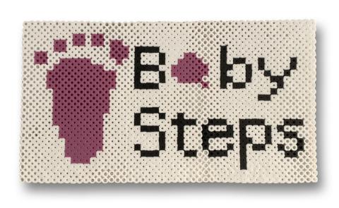 Baby steps logo made out of perler beads. 