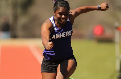 Louise runs during a track meet