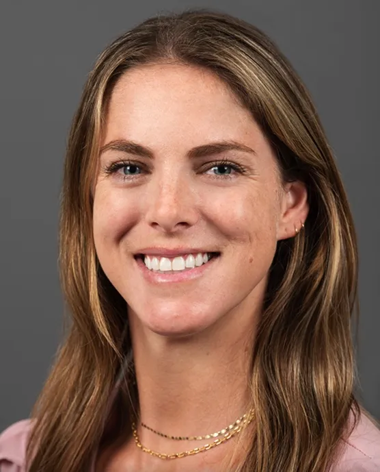 Kendall Harmon, a nurse, smiles for her headshot.