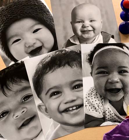 A group of diverse baby photos in black and white.